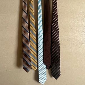 Man ties brown, bronze, maroon, yellow, blue